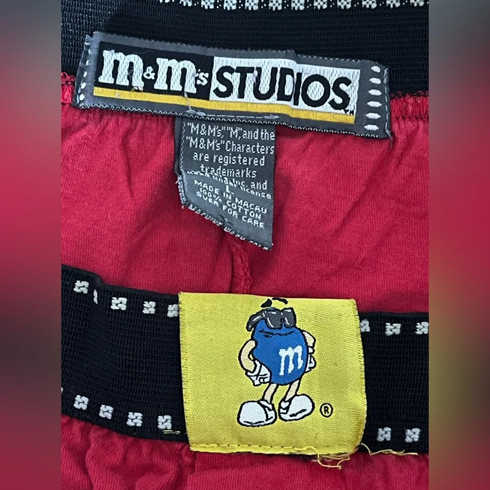 Vibrant red M&M’s women’s shorts with elastic waistband. Women’s Size Large
